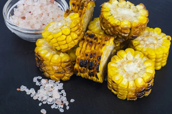 Snack from pieces of grilled corn — Stock Photo, Image