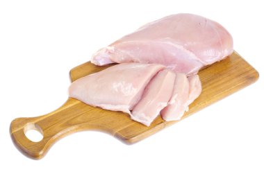 Mutfak ahşap kesme tahtası üzerinde tavuk fileto