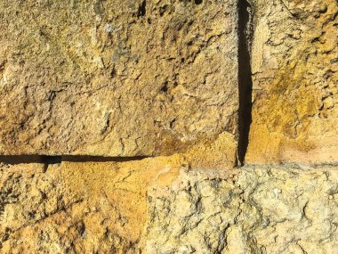 Doku, arka plan, büyük doğal, işlenmemiş taş duvar