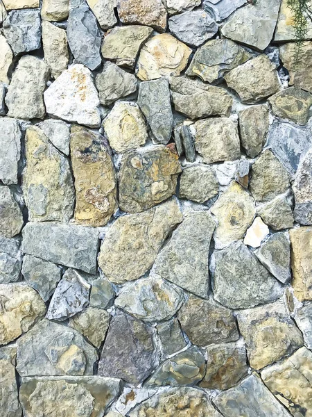 Textura, fundo, parede de grandes pedras naturais, não tratadas — Fotografia de Stock