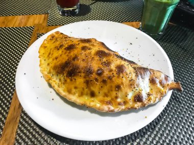 Pizza calzone pizzacı tablo. Studio fotoğraf