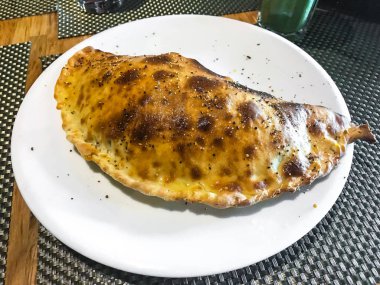 Pizza calzone pizzacı tablo. Studio fotoğraf