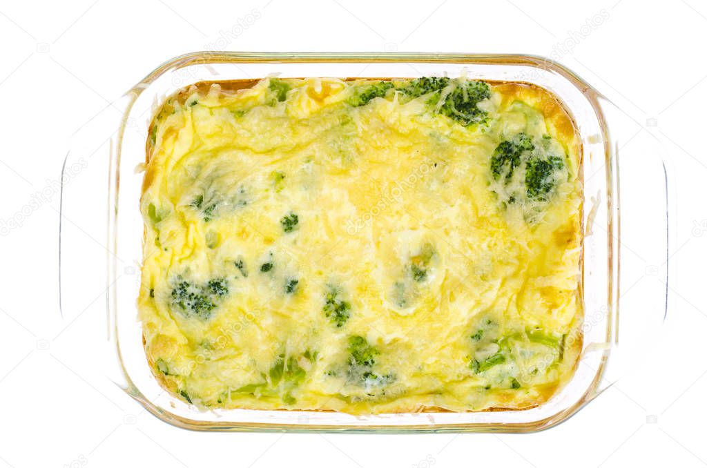 Omelette of eggs, broccoli, cheese in glass heat-resistant form, baked in oven. Studio Photo