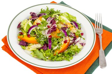 Trabzon hurması ve susam tohumu, sağlıklı gıda salatası. Studio fotoğraf