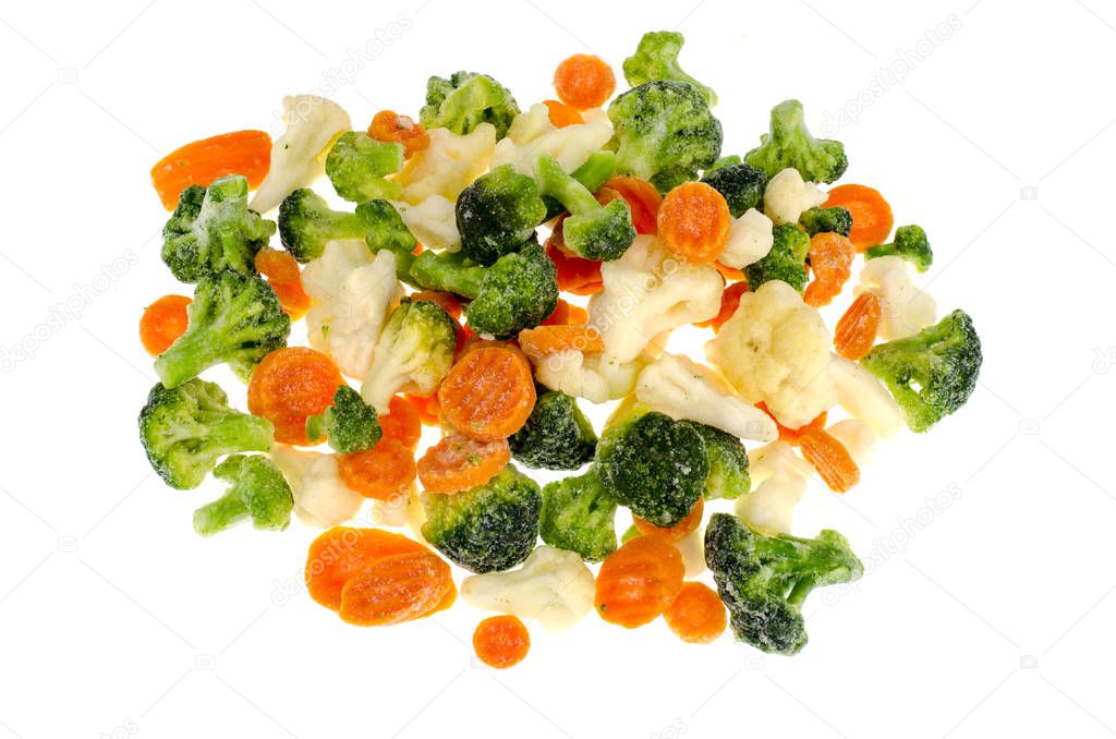 Frozen broccoli, cauliflower, carrots on white background. Studio Photo