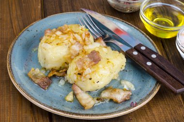 Cepelinai Potatoes with meat gravy. Studio Photo clipart