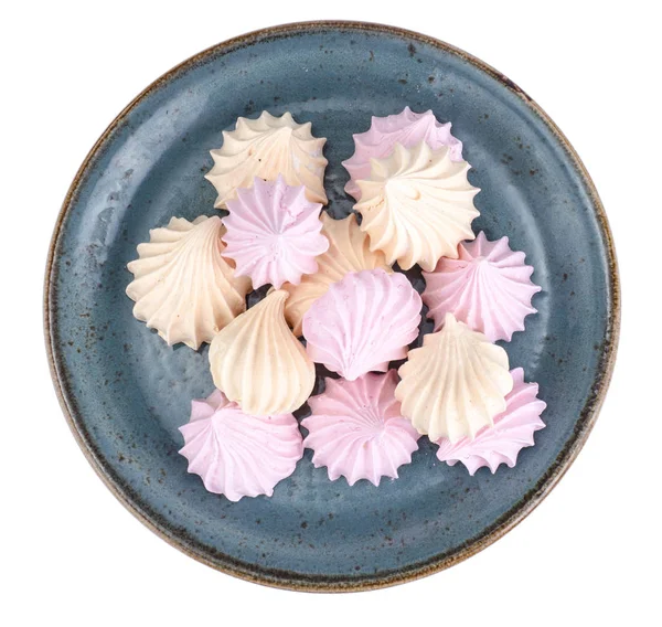 Küçük meringues beyaz arka plan üzerinde renkli. Studio fotoğraf