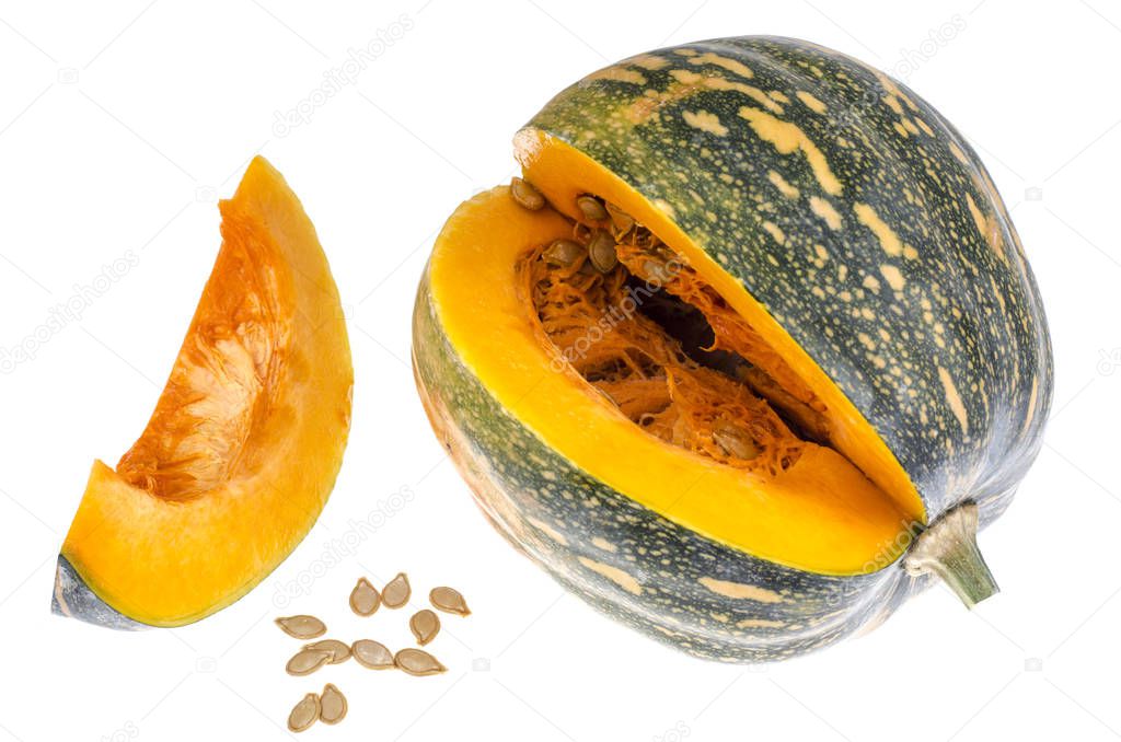 Whole round ripe pumpkin and sliced lobules on white background. Studio Photo