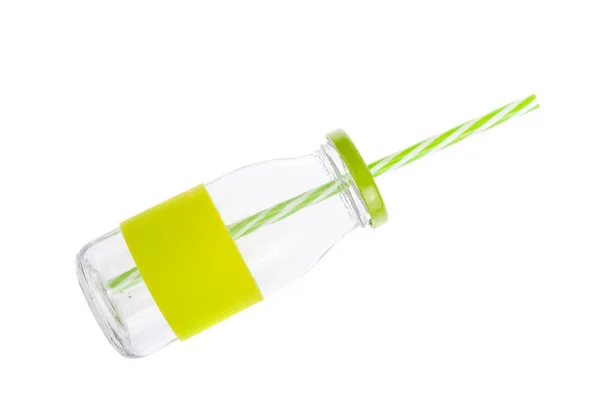 Garrafa de vidro com tampa verde e tubo de beber — Fotografia de Stock