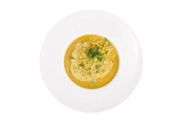 Placa branca com sopa de purê de milho — Fotografia de Stock