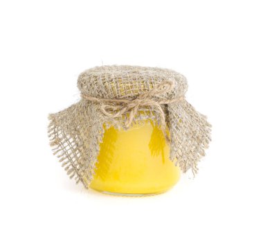 Taze sarı çiçek bal ile Cam kavanoz. 