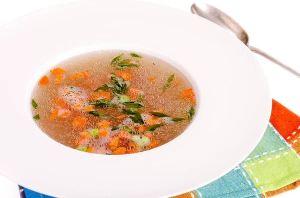 Dietary vegetable soup with carrots, peas and green onions. — Stock Photo, Image