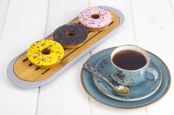 Fresh donuts, hot tea for lunch. — Stock Photo, Image
