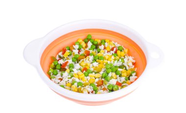 Frozen vegetables with rice isolated on white background clipart