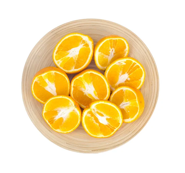 Wooden dish with juicy sliced orange isolated on white background. — Stock Photo, Image