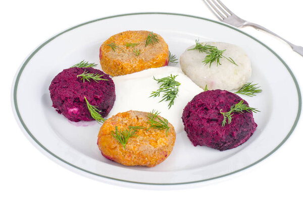 Vegetable burgers from beets, carrots, potatoes. Vegetarian menu.