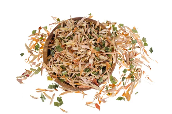 Dried lemongrass leaves in wooden bowl. — Stock Photo, Image