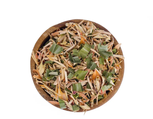 Dried lemongrass leaves in wooden bowl. — Stock Photo, Image