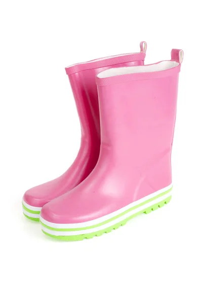 儿童粉红色橡胶靴步行. — 图库照片