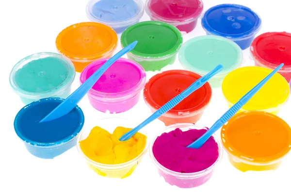 Color plastilina en frascos — Foto de Stock