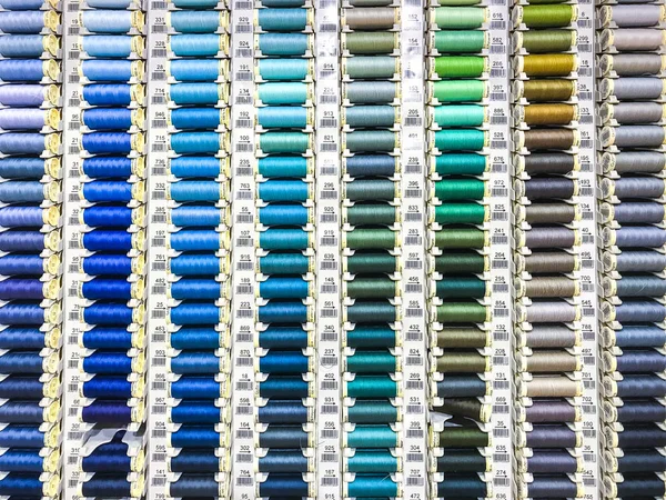 Spools of colored sewing thread — Stock Photo, Image