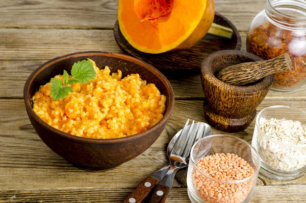 Vegetarian food, porridge with pumpkin and lentils. — Stock Image Vegetarian food, porridge with pumpkin and lentils. Stock Image