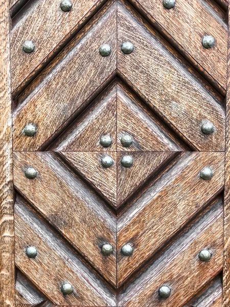 Zabytkowe drewniane drzwi z wzorem — Zdjęcie stockowe