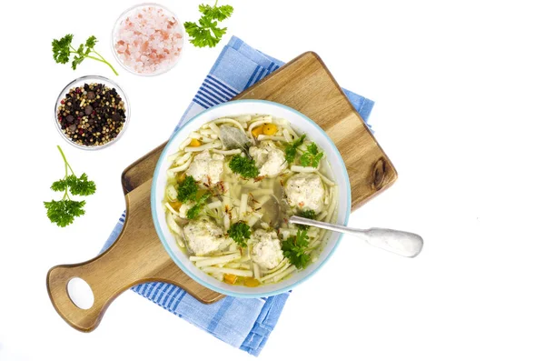 Chicken broth with egg noodles and meatballs. — Stock Photo, Image