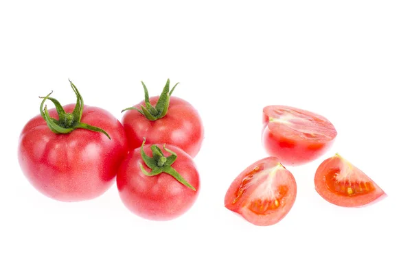 Tomates rojos y rosados frescos aislados sobre fondo blanco — Foto de Stock