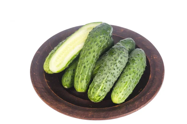 Fresh green cucumbers on ceramic bowl. Photo — Stock Photo, Image