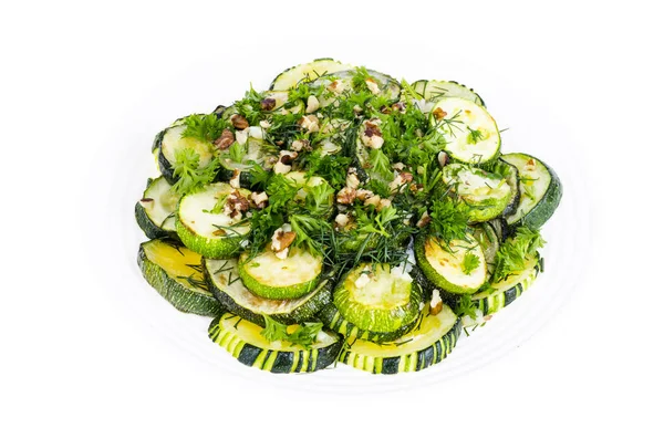 Fried zucchini with green greens, garlic and walnuts. — Stock Photo, Image