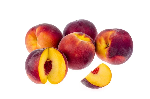 Several ripe sweet peaches isolated on white background. — Stock Photo, Image