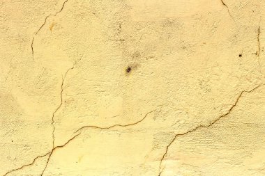 Sarı boyalı, grunge, eski duvar doku arka plan