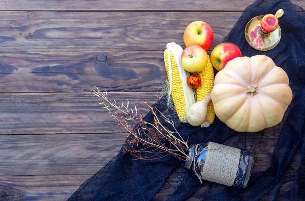 Halloween Concept Still Life Pumpkin Candle Apples Corn Wooden Background — Stock Photo, Image