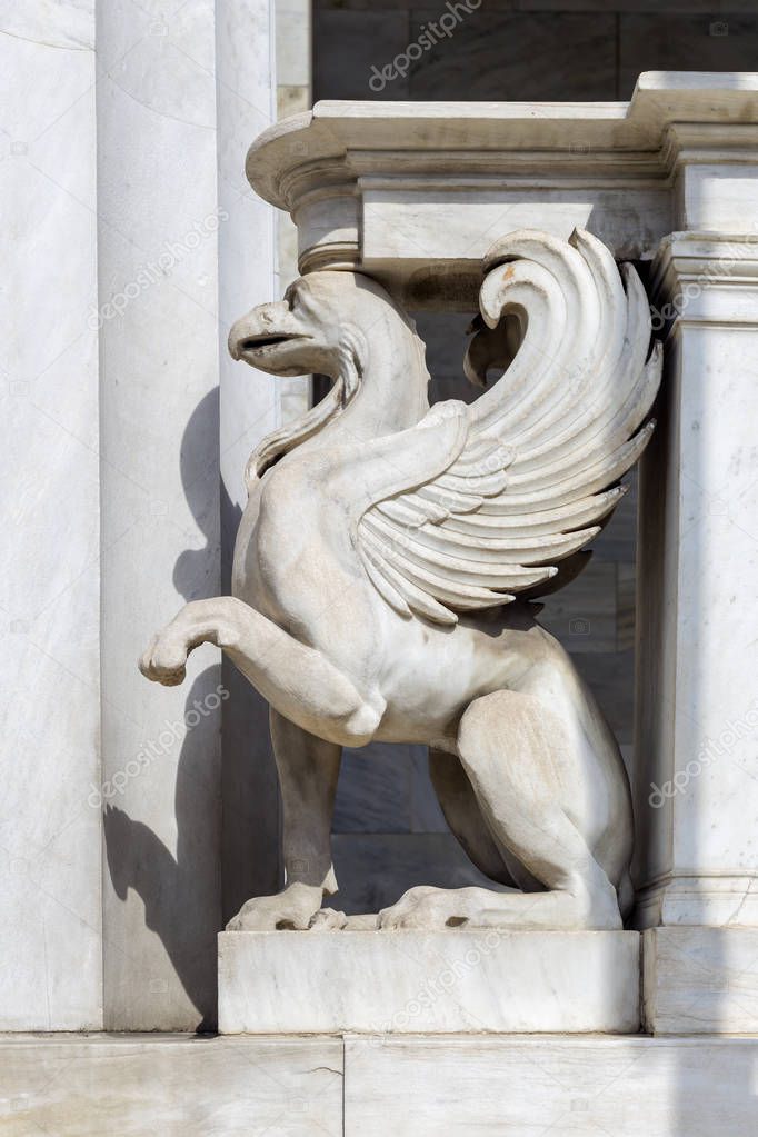 Cityscape. The sculptures of the National Library of Greece in the city of Athens in neoclassic style on a sunny day.