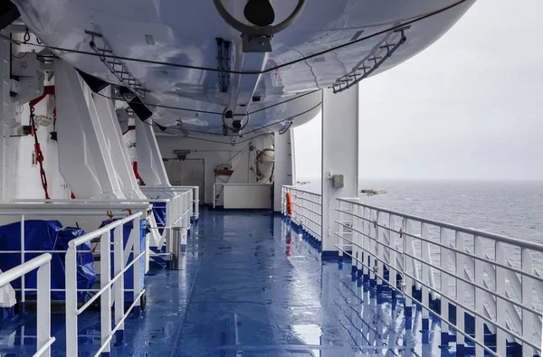 Equipment for saving lives on the deck of a ship on a cloudy, rainy day