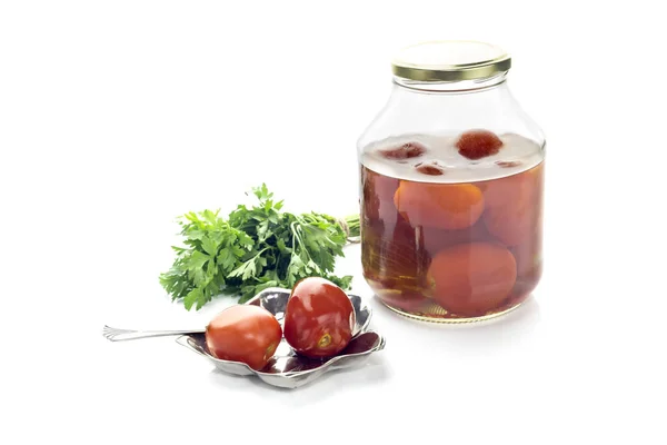 Parsley and pickled tomatoes on a white background — Stock Image Parsley and pickled tomatoes on a white background Royalty Free Stock Images