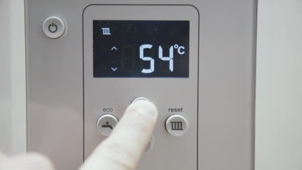 Male finger pushes boiler display buttom. 4K — Stock Footage Male finger pushes boiler display buttom. 4K Royalty Free Stock Footage
