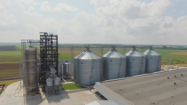 Aerial view of agriculture grain silos storage tank. 4K — Stock Video