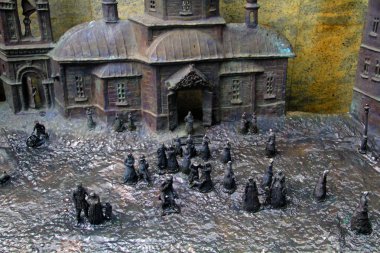 Erimiş insanlar ve metal evlerin bileşimi