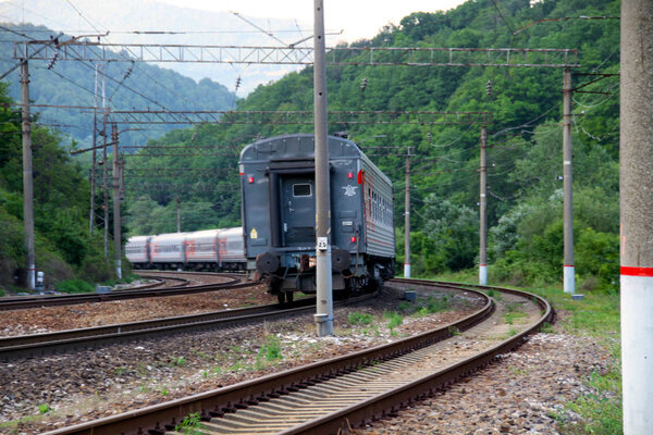 View of the train passing through the North Caucasus mainline. Railway.