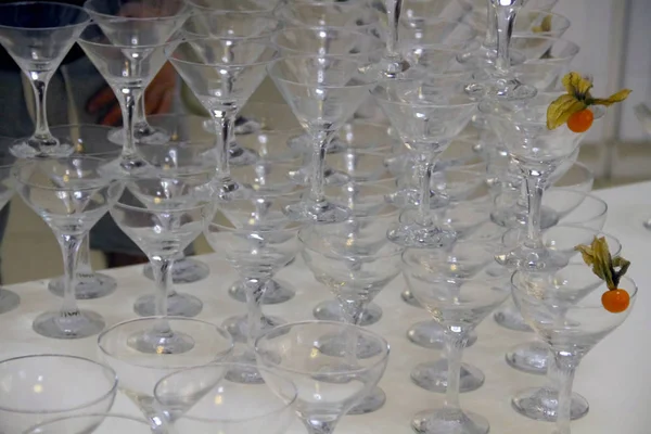 champagne glasses standing in a pyramid at a wedding