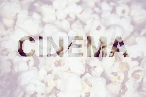 Pyszny Popcorn Napisem Kino Zbliżenie Obrazu Tła Zdjęcie Makro — Zdjęcie stockowe