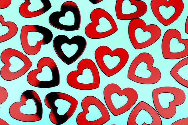 Turkuaz Arka Plan Dekoratif Kırmızı Kalpler — Stok fotoğraf