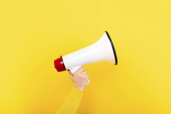 Megaphone on a yellow background — Stock Photo, Image