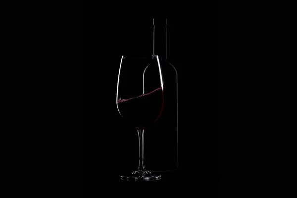 Red wine glass and bottle — Stock Photo, Image