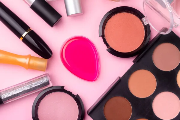 professional cosmetics on pink background