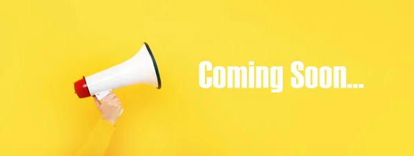 Megaphone Hand Inscription Coming Soon Yellow Background — Stock Photo, Image