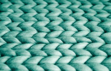 Geçmişi. Turkuaz Merino yününden örülmüş kumaş. Büyük dokuma. Örgü örgüsü..