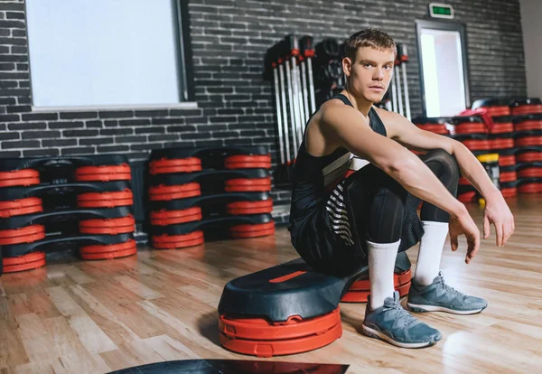 Horizontal Shot Sporty Athletic Man Sitting Stepper Relaxing Exercises Gym — Stock Photo, Image